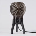 The Visitor table lamp in Blackout on a white background.