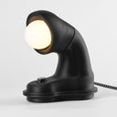 The Nessi table lamp in Blackout