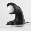 The short Nessi table lamp in Charcoal