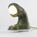 The short Nessi table lamp in Olive