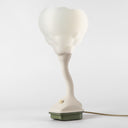 The Nimbus table lamp in Putty/Olive on a white background