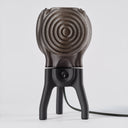 The Visitor table lamp in Blackout on a white background.