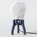 The Visitor table lamp in Navy on a white background.