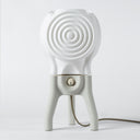 The Visitor table lamp in Putty on a white background.